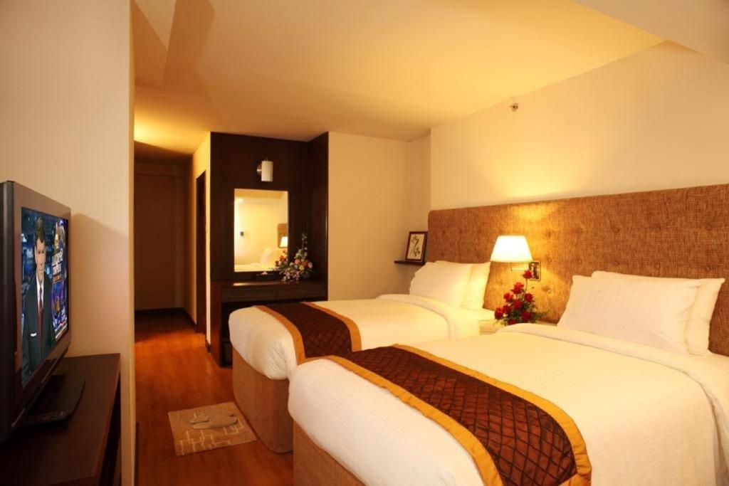 Hotel Furama Čiang Mai Pokoj fotografie