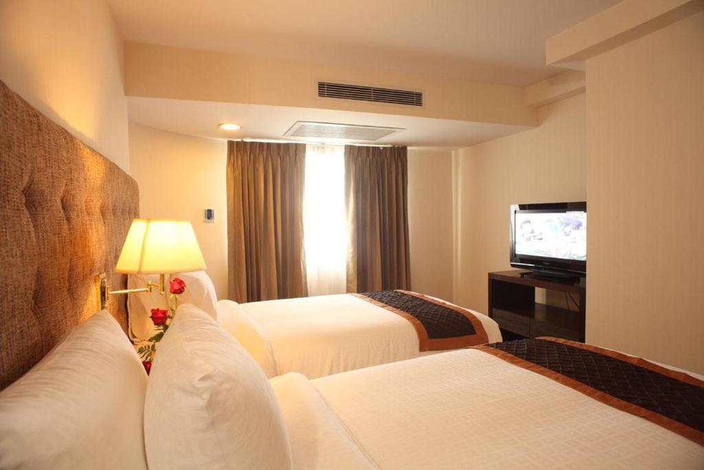 Hotel Furama Čiang Mai Pokoj fotografie